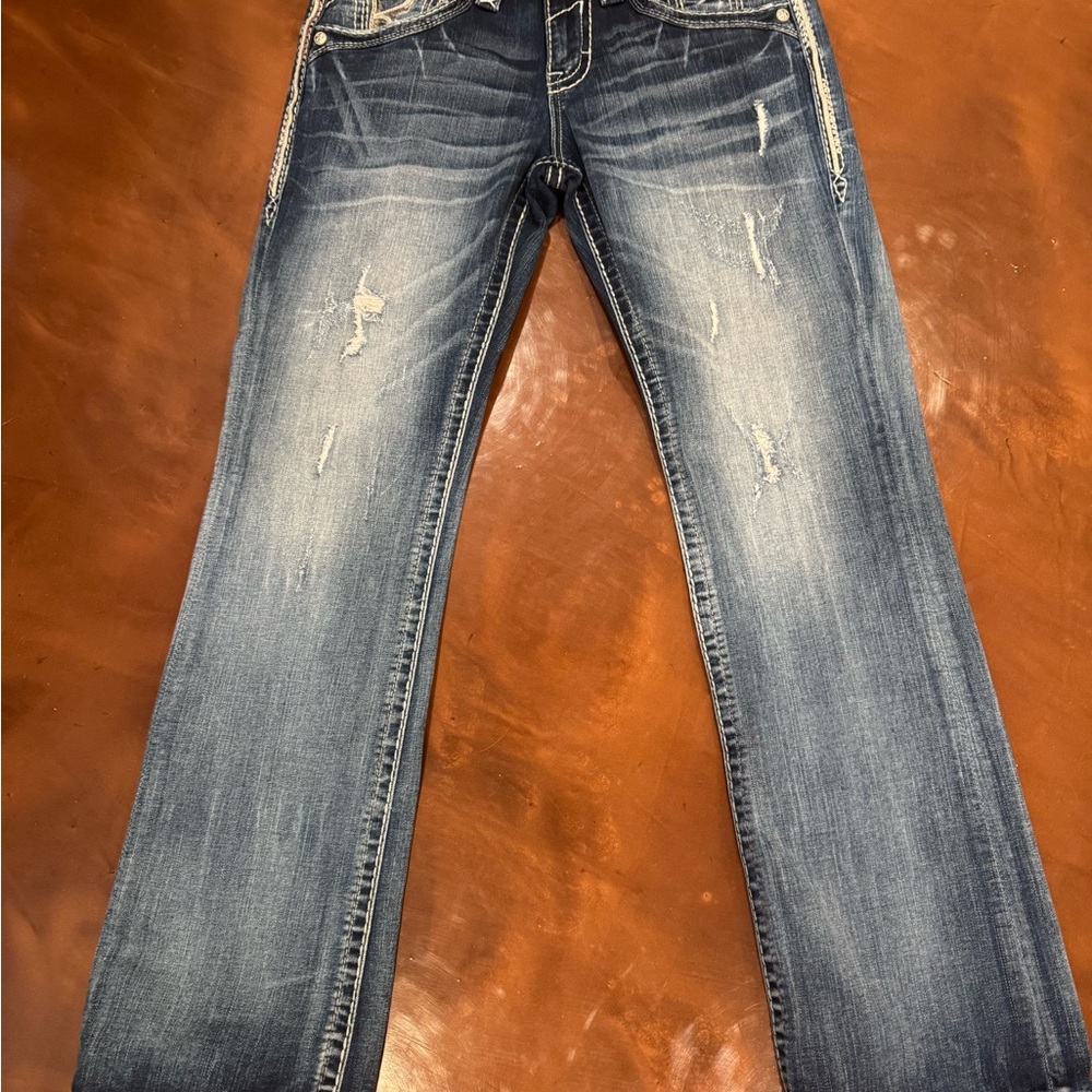 Distressed Blue Jeans